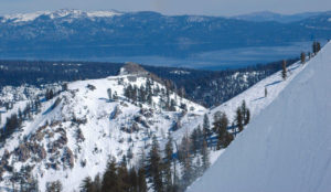 Looking at Lake Tahoe from snowy Squaw Valley (now Palisades Tahoe) Ski Resort | Photo: Courtesy Eddy Ancinas